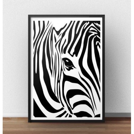 A poster with a close-up of a zebra's eye framed in a simple frame
