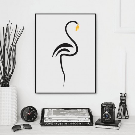 A poster with a black flamingo and a yellow beak in a Scandinavian interior