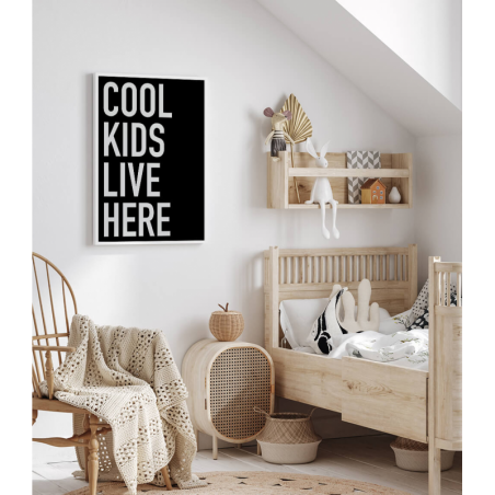 Black poster with the words "Cool kids live here"